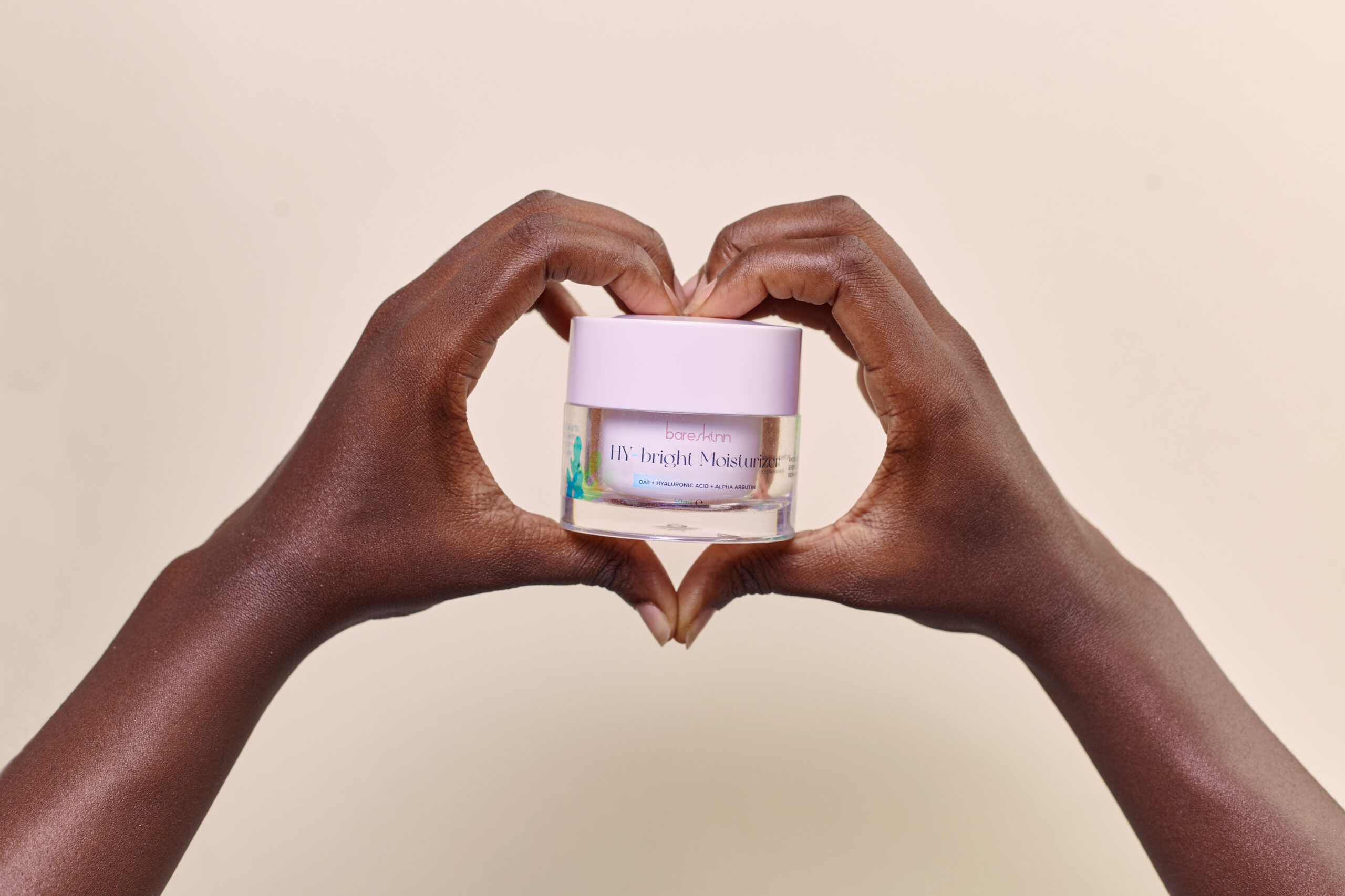 HY-Bright moisturizer in hand
